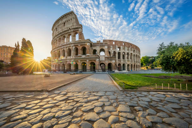 colosseum in rome with morning sun, italy, europe.